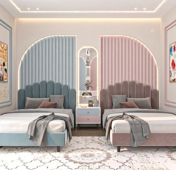 Stylish twin bedroom featuring upholstered headboards in muted blue and soft pink, layered bedding, two-toned nightstand with books and flowers, mirrored shelving unit with ambient lighting, arched wall panels, patterned rug, and recessed ceiling lights.